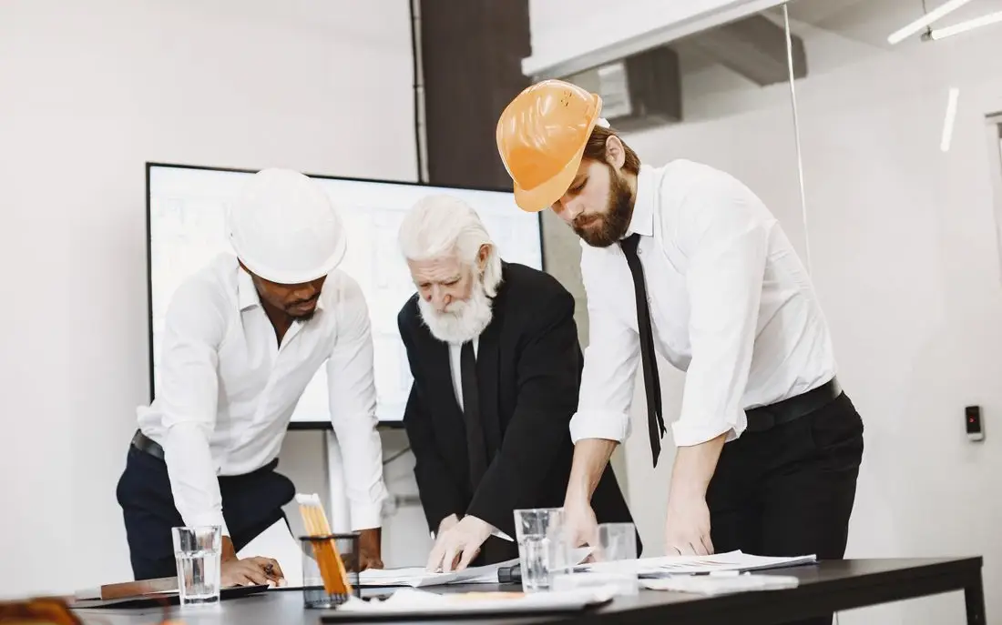 Commercial team reviewing a project together in the office
